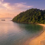 Forested bay and sandy beach on Koh Phayam in Ranong province