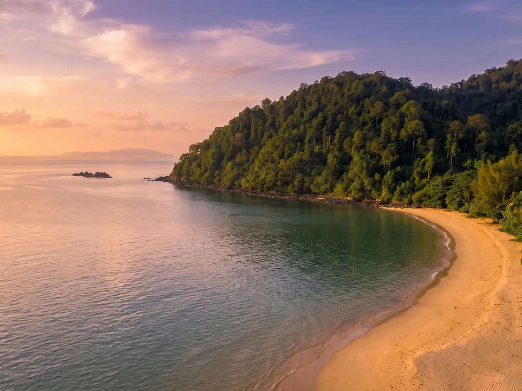 Forested bay and sandy beach on Koh Phayam in Ranong province